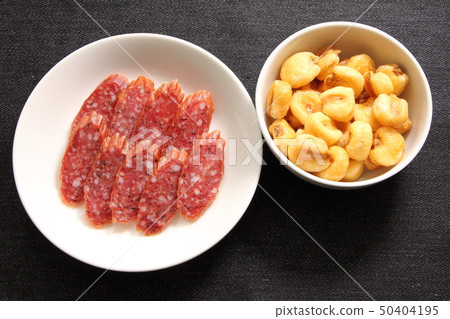 Dry sausage and giant corn. 50404195