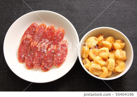 Dry sausage and giant corn. Dry sausage and giant corn. 50404196