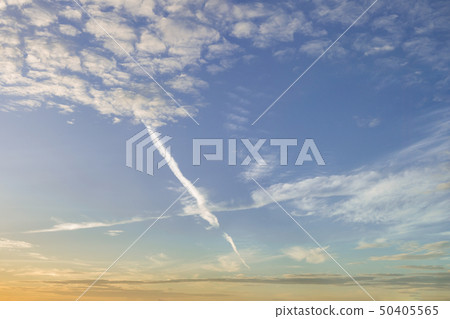 Blue sky and white puffy clouds on sunrise time. 50405565