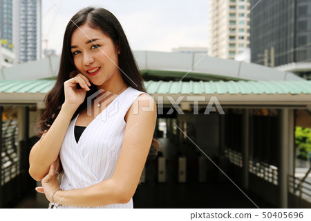 Close-up beautiful Asia woman smile portrait. Close-up beautiful Asia woman smile portrait. 50405696