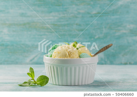 Ice cream with mint in ceramic bowl 50406660