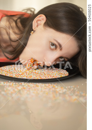 girl with sugar balls 50408025