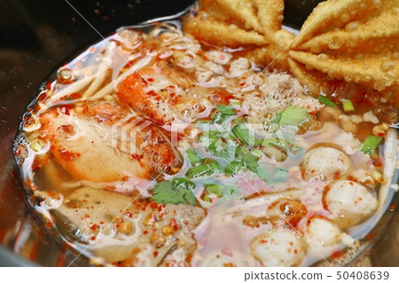 Spicy pork noodle soup 50408639