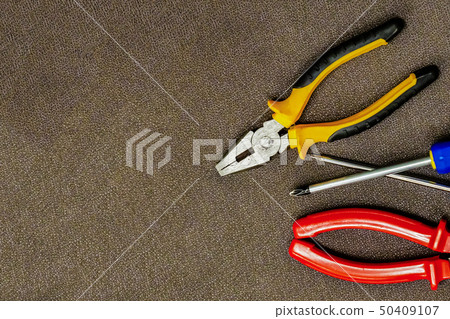 hand tool red nippers pair of iron screwdrivers 50409107