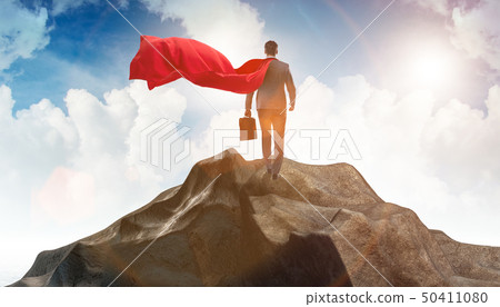 Superhero businessman on top of mountain - Stock Photo [50411080] - PIXTA