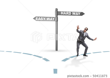 Businessman choosing between hard and easy way 50411873