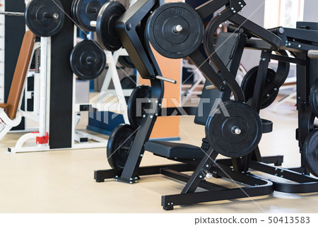 Close-up empty Smith machine in modern gym 50413583