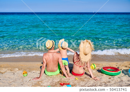 Family on beach in Greece 50413741