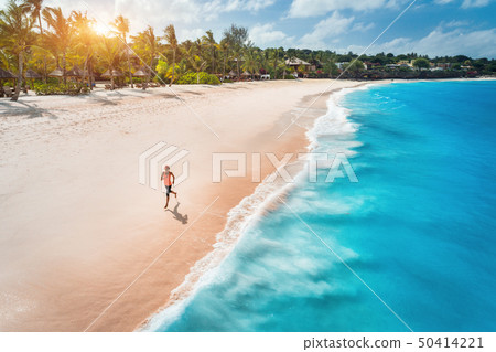 Aerial view of the running young woman Aerial view of the running young woman 50414221