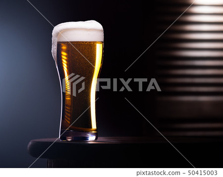 Glass of light beer Glass of light beer 50415003