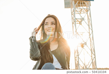 Beautiful charming brunette long hair happy asian Beautiful charming brunette long hair happy asian 50418104