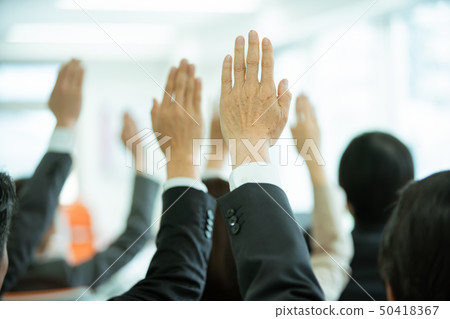 Raised hand business suit Raised hand business suit 50418367