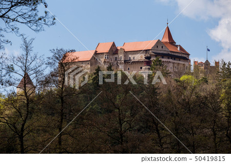 Pernstejn Castle stands in the woods on a high Pernstejn Castle stands in the woods on a high 50419815