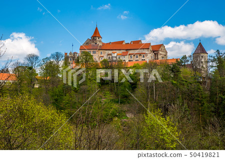 Pernstejn Castle stands in the woods on a high Pernstejn Castle stands in the woods on a high 50419821