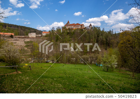 Pernstejn Castle stands in the woods on a high Pernstejn Castle stands in the woods on a high 50419823