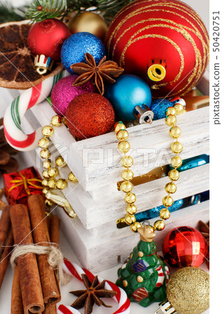 Christmas composition with spices and ornaments Christmas composition with spices and ornaments 50420751