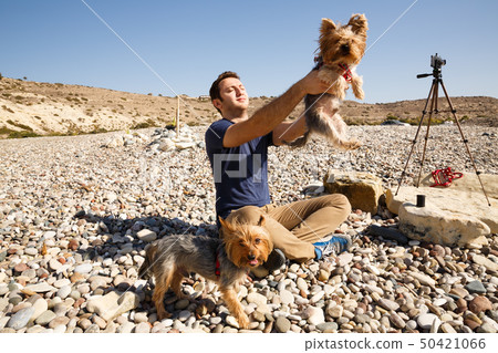 Man and dogs 50421066