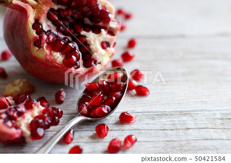 Open fresh ripe pomegranates 50421584