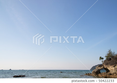 tropical sea and beach with blue sky background 50422233
