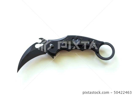 Claw-shaped knife with a clip. Metal animal claw. 50422463