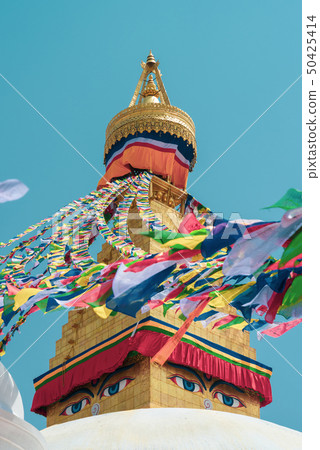 The close-up shot to the eye of the Boudhanath The close-up shot to the eye of the Boudhanath 50425414