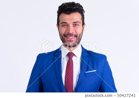 Portrait of happy bearded Persian businessman smiling Portrait of happy bearded Persian businessman smiling 50427241