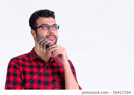 Portrait of handsome bearded Persian hipster man thinking 50427294