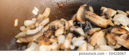 Fried mushrooms in a pan food ingredient 50428067