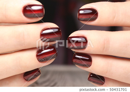 glamorous beautiful manicure on a trendy texture background 50431701