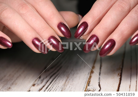 Women's hands with a stylish manicure. Best 50431859