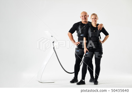 beautiful girl and handsome guy looking at the camera beautiful girl and handsome guy looking at the camera 50435640