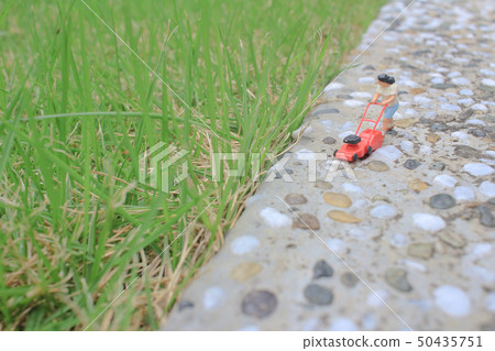 mini figure using push lawnmower mow yard 50435751