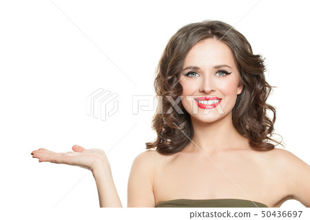 Smiling woman with empty open hand isolated Smiling woman with empty open hand isolated 50436697