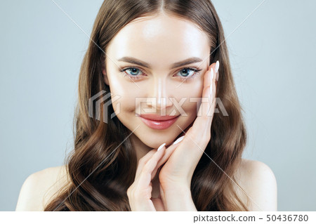 Young smiling woman with clear skin  50436780