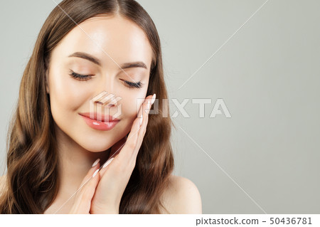 Young perfect woman with clear skin smiling, spa Young perfect woman with clear skin smiling, spa 50436781