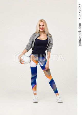 beautiful athletic woman with the ball 50437067
