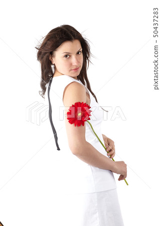 Portrait of a beautiful young woman in white 50437283