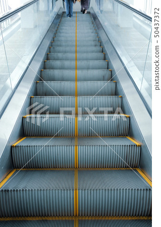 escalator in modern business building escalator in modern business building 50437372