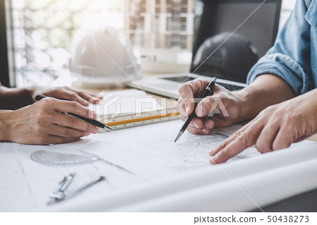 Hands of architect or engineer working on 50438273