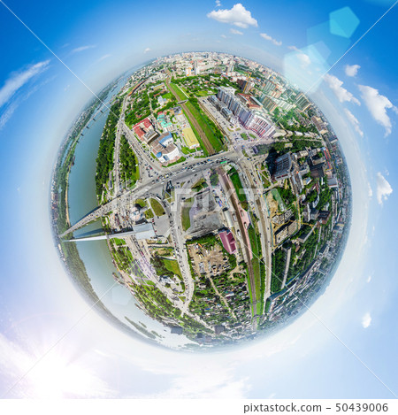 Aerial city view with crossroads and roads, houses buildings. Copter shot. Panoramic image. Aerial city view with crossroads and roads, houses buildings. Copter shot. Panoramic image. 50439006