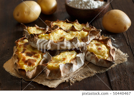 Traditional karelian pasties with potatoes Traditional karelian pasties with potatoes 50440467