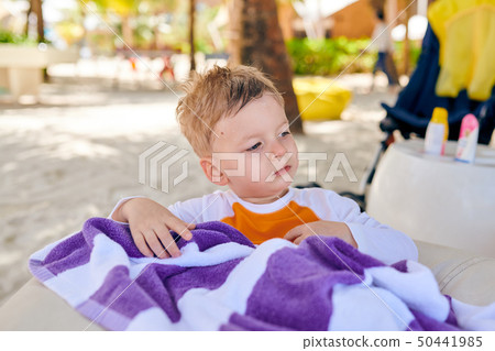Three year old toddler boy on beach Three year old toddler boy on beach 50441985