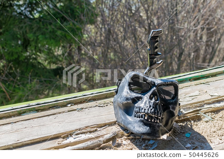 scary skull mask and old battle knife 50445626