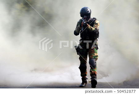 Special force assault under smoke screen 50452877