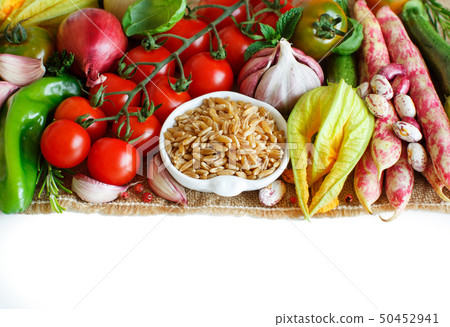 Uncooked kamut grain with vegetables Uncooked kamut grain with vegetables 50452941