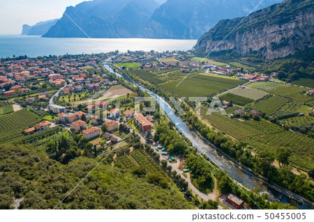 Aerial view on Nago Torbole city and Sarca River. Aerial view on Nago Torbole city and Sarca River. 50455005