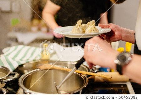 Freshly cooked khinkali dumplings Freshly cooked khinkali dumplings 50455082