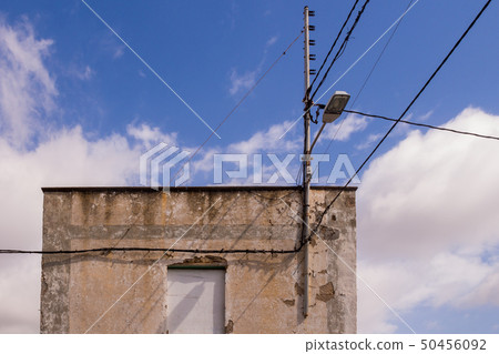 Top of a house with cables net 50456092