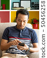 asia man user interact application smartphone on 50456258
