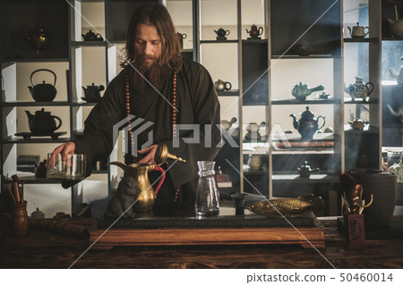 Tea ceremony is perfomed by tea master 50460014